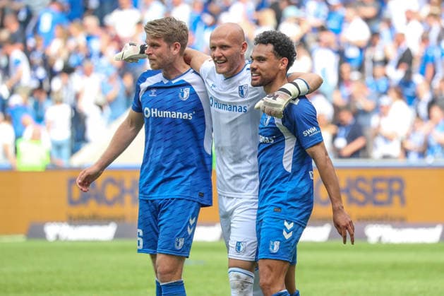 03.05.2026, xgox, Fussball - 2.Bundesliga 1.FC Magdeburg - Hertha BSC Berlin emspor, v.l. Marcus Mathisen (Magdeburg, 16), Dominik Reimann (Magdeburg, 1), Herbert Bockhorn (Magdeburg, 7) Jubel ueber den Sieg, Jubel nach Spielende (DFL DFB REGULATIONS PROHIBIT ANY USE OF PHOTOGRAPHS as IMAGE SEQUENCES and or QUASI-VIDEO) Magdeburg