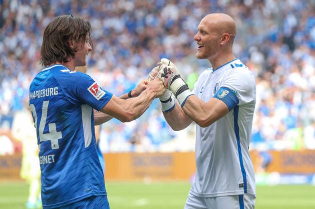 03.05.2026, xgox, Fussball - 2.Bundesliga 1.FC Magdeburg - Hertha BSC Berlin emspor, v.l. Jean Hugonet (Magdeburg, 24), Dominik Reimann (Magdeburg, 1) Jubel ueber den Sieg, Jubel nach Spielende (DFL DFB REGULATIONS PROHIBIT ANY USE OF PHOTOGRAPHS as IMAGE SEQUENCES and or QUASI-VIDEO) Magdeburg