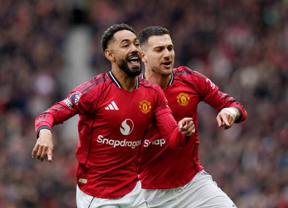 Manchester, England, 3rd May 2026. Matheus Cunha of Manchester United, ManU celebrates scoring the first goal during the Manchester United vs Liverpool Premier League match at Old Trafford, Manchester. Picture credit should read: Andrew Yates Sportimage EDITORIAL USE ONLY. No use with unauthorised audio, video, data, fixture lists, club league logos or live services. Online in-match use limited to 120 images, no video emulation. No use in betting, games or single club league player publications. SPI_023_AY_MAN_UTD_LIVERPOOL SPI-4776-0023
