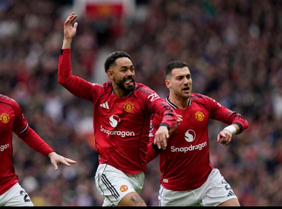 Manchester, England, 3rd May 2026. Matheus Cunha of Manchester United, ManU celebrates scoring the first goal during the Manchester United vs Liverpool Premier League match at Old Trafford, Manchester. Picture credit should read: Andrew Yates Sportimage EDITORIAL USE ONLY. No use with unauthorised audio, video, data, fixture lists, club league logos or live services. Online in-match use limited to 120 images, no video emulation. No use in betting, games or single club league player publications. SPI_032_AY_MAN_UTD_LIVERPOOL SPI-4776-0032