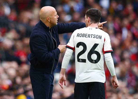 Liverpool manager Arne Slot issues instructions to Andrew Robertson Manchester United, ManU v Liverpool, Premier League, Football, Old Trafford, Manchester , UK - 03 May 2026Manchester Old Trafford United Kingdom EDITORIAL USE ONLY No use with unauthorised audio, video, data, fixture lists, club league logos or live services. Online in-match use limited to 120 images, no video emulation. No use in betting, games or single club league player publications.  Copyright: xMattxWest Shutterstockx 16854589aa