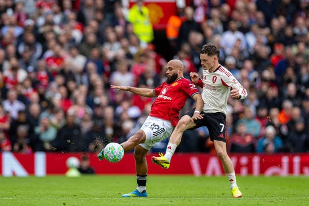 Football - FA Premier League - Manchester United, ManU FC v Liverpool FC MANCHESTER, ENGLAND - Sunday, May 3, 2026: Liverpool s Florian Wirtz (R) challenges Manchester United s Bryan Mbeumo during the FA Premier League match between Manchester United FC and Liverpool FC at Old Trafford. (Photo by David Rawcliffe Propaganda) MANCHESTER Old Trafford GREATER MANCHESTER ENGLAND  Copyright: xDavidxRawcliffex P2026-05-03-Man_Utd_Liverpool-70