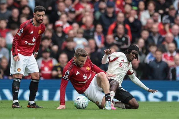Manchester United, ManU v Liverpool - Premier League Jeremie Frimpong of Liverpool is tackled by Luke Shaw of Manchester United during the Premier League match between Manchester United and Liverpool at Old Trafford in Manchester, United Kingdom, on May 3, 2026. Manchester Greater Manchester United Kingdom  Copyright: xNewsxImagesx originalFilename:cosgrove-premierl260503_np2uL.jpg