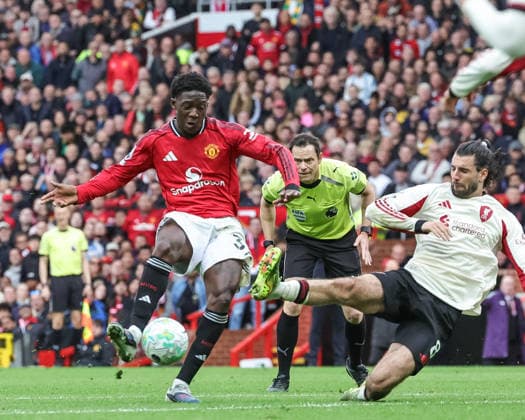 Premier League: Manchester United, ManU v Liverpool Kobbie Mainoo of Manchester United scores to make it 3-2 during the Premier League match Manchester United vs Liverpool at Old Trafford, Manchester, United Kingdom on 03 May 2026 (Photo by Mark Cosgrove News Images) Manchester Old Trafford Greater Manchester United Kingdom Copyright: xMarkxCosgrove NewsxImagesx