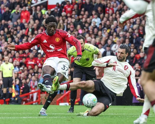 Premier League: Manchester United, ManU v Liverpool Kobbie Mainoo of Manchester United scores to make it 3-2 during the Premier League match Manchester United vs Liverpool at Old Trafford, Manchester, United Kingdom on 03 May 2026 (Photo by Mark Cosgrove News Images) Manchester Old Trafford Greater Manchester United Kingdom Copyright: xMarkxCosgrove NewsxImagesx