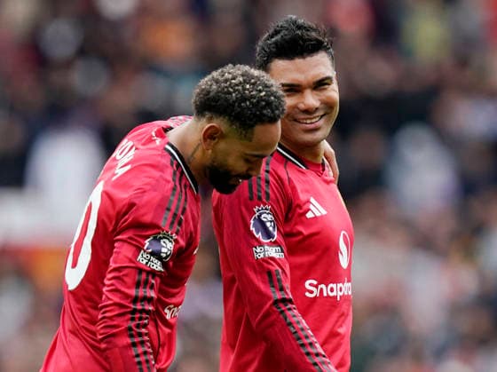 Manchester, England, 3rd May 2026. Matheus Cunha of Manchester United, ManU and Casemiro of Manchester United celebrate the win during the Manchester United vs Liverpool Premier League match at Old Trafford, Manchester. Picture credit should read: Andrew Yates Sportimage EDITORIAL USE ONLY. No use with unauthorised audio, video, data, fixture lists, club league logos or live services. Online in-match use limited to 120 images, no video emulation. No use in betting, games or single club league player publications. SPI_116_AY_MAN_UTD_LIVERPOOL SPI-4776-0115