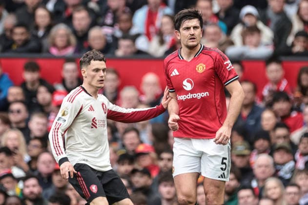 Premier League: Manchester United, ManU v Liverpool Florian Wirtz of Liverpool holds off Harry Maguire of Manchester United during the Premier League match Manchester United vs Liverpool at Old Trafford, Manchester, United Kingdom on 03 May 2026 (Photo by Mark Cosgrove News Images) Manchester Old Trafford Greater Manchester United Kingdom Copyright: xMarkxCosgrove NewsxImagesx