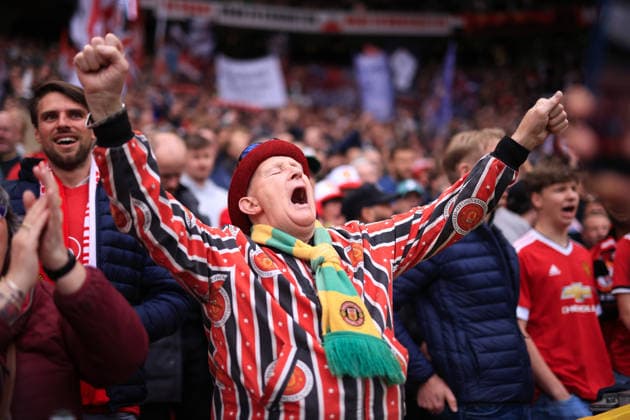 Football - Premier League - Manchester United, ManU v Liverpool 3rd May 2026 - Premier League - Manchester United v Liverpool - Manchester United fans cheer on their side - Photo: Simon Stacpoole Offside. Manchester UK Copyright: xSimonxStacpoolexOffside
