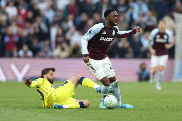 Aston Villa v Tottenham 3 May 2026, Aston - Premier League Football - Aston Villa v Tottenham Hotspur - Rodrigo Bentancur of Tottenham Hotspur tackles Lamare Bogarde of Aston Villa - Photo: Charlotte Wilson Offside. Aston UK Copyright: xCharlottexWilsonx xOffsidexOffside