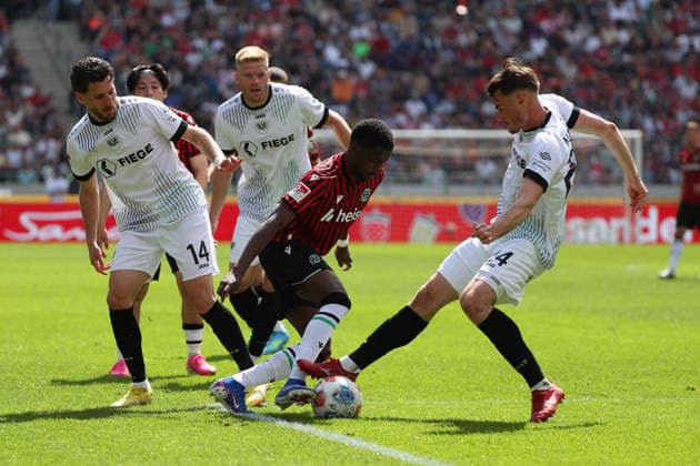 Hannover 96 vs Münster, 2. BL Hannover, 03.05.2026, Fussball - Herren, 2. BL, Saison 2025 2026, Hannover 96 vs Preußen Münster, Charalambos Makridis (Münster), Noel Aseko Nkili (Hannover 96),Niko Koulis (Münster), (DFL DFB REGULATIONS PROHIBIT ANY USE OF PHOTOGRAPHS as IMAGE SEQUENCES and or QUASI-VIDEO) Heinz von Heiden Arena Niedersachsen Deutschland