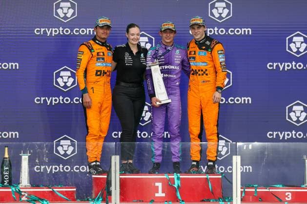 l-r: auf dem Podium, 2 Platz Lando Norris (McLaren Formula 1 Team), Amy Walker (Mercedes-AMG Petronas), Winner, Sieger, Kimi Antonelli (Mercedes-AMG Petronas 12), 3 Platz Oscar Piastri (McLaren Formula 1 Team 81), Grosser Preis von Miami, Motorsport, Herren, Formel 1, Rennen, 03.05.2026 Miami Florida USA