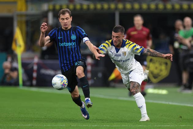 Milan, Italy, 2nd May 2026. Gabriel Tadeu Streffezza Rebelato of Parma Calcio tussles with Nicolo Barella of FC Internazionale during the FC Internazionale vs Parma Calcio 1913 Serie A match at Giuseppe Meazza, Milan. Picture credit should read: Jonathan Moscrop Sportimage EDITORIAL USE ONLY. No use with unauthorised audio, video, data, fixture lists, club league logos or live services. Online in-match use limited to 120 images, no video emulation. No use in betting, games or single club league player publications. SPI_018_JM_INTER_PARMA SPI-4756-0018