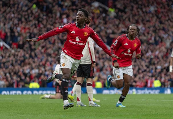 Manchester United, ManU v Liverpool - Premier League MANCHESTER, ENGLAND - MAY 3: Kobbie Mainoo of Manchester United celebrates scoring the third goal during the Premier League match between Manchester United and Liverpool at Old Trafford on May 3, 2026 in Manchester, England. Kobbie Mainoo Manchester Old Trafford England United Kingdom Copyright: xVisionhausx 776340702