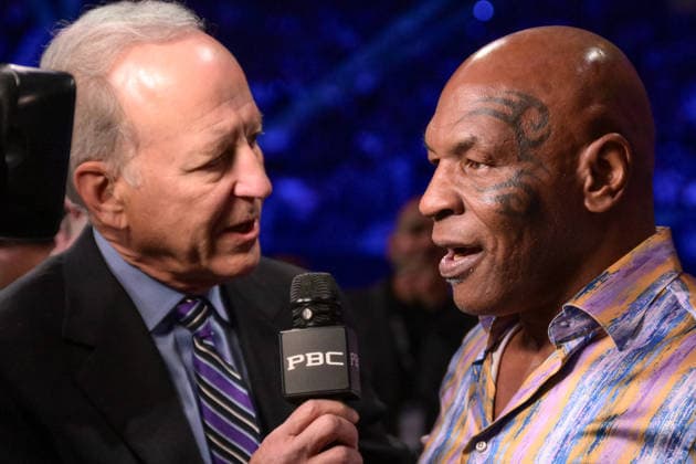 May 3, 2026, Las Vegas, Nevada, USA: JIM GREY (L) talks to MIKE TYSON (R) about the fight during PBC boxing at the T Mobile Arena in Las Vegas Boxing 2026: David Benavidez Vs Zurdo Ramarez: Fight Night  - ZUMAo117 20260503_zsp_o117_023 Copyright: xMikaelxOnax
