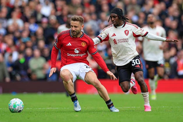 Manchester United, ManU v Liverpool, Premier League Luke Shaw (23) of Manchester United is challenged by Jeremie Frimpong (30) of Liverpool during the Premier League match between Manchester United and Liverpool at Old Trafford, Manchester, UK on 3 May 2026. Manchester Old Trafford Greater Manchester UK Editorial use only DataCo restrictions apply See www.football-dataco.com , Copyright: xConorxMolloyx PSI-24192-0196