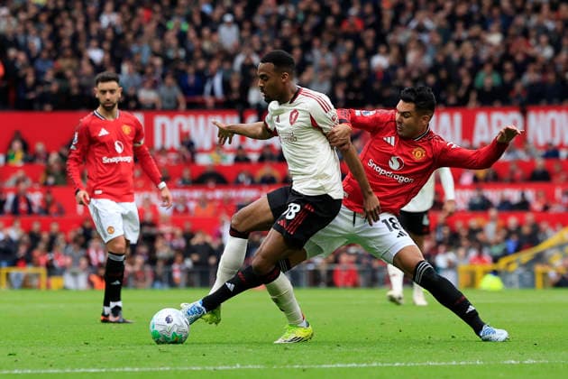 Manchester United, ManU v Liverpool, Premier League Ryan Gravenberch (38) of Liverpool is challenged by Casemiro (18) of Manchester United during the Premier League match between Manchester United and Liverpool at Old Trafford, Manchester, UK on 3 May 2026. Manchester Old Trafford Greater Manchester UK Editorial use only DataCo restrictions apply See www.football-dataco.com , Copyright: xConorxMolloyx PSI-24192-0218
