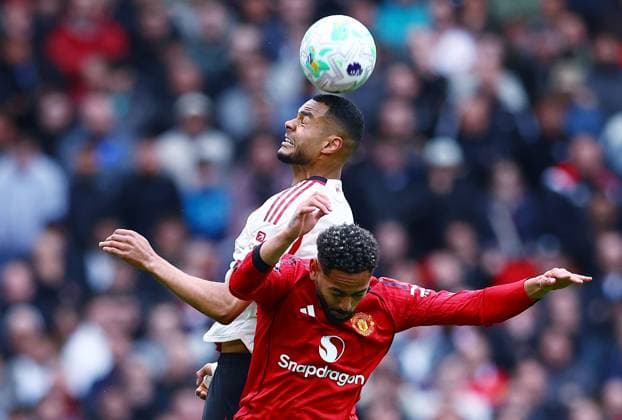 Cody Gakpo of Liverpool and Matheus Cunha of Manchester United, ManU Manchester United v Liverpool, Premier League, Football, Old Trafford, Manchester , UK - 03 May 2026Manchester Old Trafford United Kingdom EDITORIAL USE ONLY No use with unauthorised audio, video, data, fixture lists, club league logos or live services. Online in-match use limited to 120 images, no video emulation. No use in betting, games or single club league player publications.  Copyright: xMattxWest Shutterstockx 16854589bs