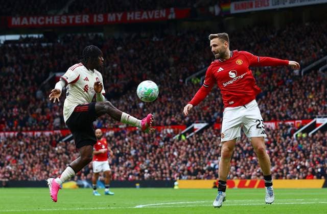 Jeremie Frimpong of Liverpool and Luke Shaw of Manchester United, ManU Manchester United v Liverpool, Premier League, Football, Old Trafford, Manchester , UK - 03 May 2026Manchester Old Trafford United Kingdom EDITORIAL USE ONLY No use with unauthorised audio, video, data, fixture lists, club league logos or live services. Online in-match use limited to 120 images, no video emulation. No use in betting, games or single club league player publications.  Copyright: xMattxWest Shutterstockx 16854589df