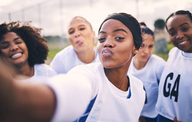 Netball, selfie and portrait of women students on a outdoor sports court for game or workout. Exercise, kiss face and athlete group together for student wellness and teamwork for training. (License=RF) 19888079 ,model released, Symbolfoto  Copyright: xZoonar.com YurixArcursx 19888079 ,model released, Symbolfoto ,property released