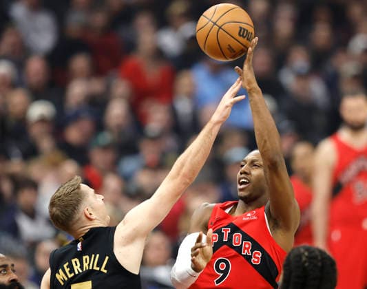 Toronto Raptors RJ Barrett (9) puts up a shot over Cleveland Cavaliers Sam Merrill (5) in the first quarter in Cleveland, Ohio Sunday May 3, 2026. The Cavaliers defeated the Raptors 114-102 to advance to play the Detroit Pistons.  CLE20260503108 AARONxJOSEFCZYK