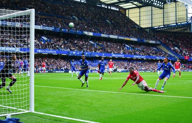 Malo Gusto of Chelsea fouls Taiwo Awoniyi of Nottingham Forest and a penalty is awarded after a VAR review Chelsea v Nottingham Forest, Premier League, Football, Stamford Bridge, London , UK - 04 May 2026London Stamford Bridge United Kingdom EDITORIAL USE ONLY No use with unauthorised audio, video, data, fixture lists, club league logos or live services. Online in-match use limited to 120 images, no video emulation. No use in betting, games or single club league player publications. Copyright: xJavierxGarcia Shutterstockx 16854610r
