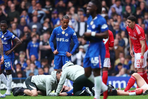 London, England, 4th May 2026. Jesse Derry of Chelsea receives medical attention before being stretchered off during the Chelsea vs Nottingham Forest Premier League match at Stamford Bridge, London. Picture credit should read: Paul Terry Sportimage EDITORIAL USE ONLY. No use with unauthorised audio, video, data, fixture lists, club league logos or live services. Online in-match use limited to 120 images, no video emulation. No use in betting, games or single club league player publications. SPI_024_PT_Chelsea_Notts_Forest SPI-4780-0024