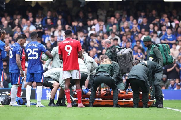 4th May 2026; Stamford Bridge, Chelsea, London, England: Premier League Football, Chelsea versus Nottingham Forest; Jesse Derry of Chelsea receives extensive treatment after a head collision with Zach Abbott of Nottingham Forest including being given oxygen before being taken off on a stretcher KatiexChan