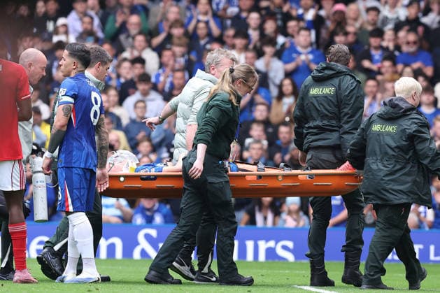4th May 2026; Stamford Bridge, Chelsea, London, England: Premier League Football, Chelsea versus Nottingham Forest; Jesse Derry of Chelsea receives extensive treatment after a head collision with Zach Abbott of Nottingham Forest including being given oxygen before being taken off on a stretcher KatiexChan