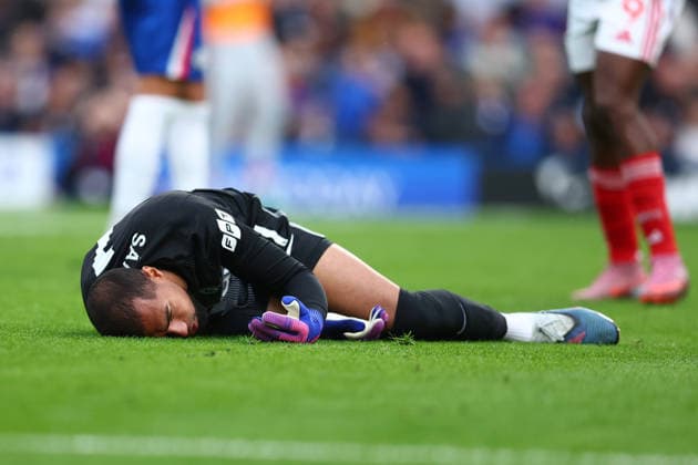 London, England, 4th May 2026. Robert Sanchez of Chelsea lays injured on the floor after a clash with Morgan Gibbs-White of Nottingham Forest before substituted during the Chelsea vs Nottingham Forest Premier League match at Stamford Bridge, London. Picture credit should read: Paul Terry Sportimage EDITORIAL USE ONLY. No use with unauthorised audio, video, data, fixture lists, club league logos or live services. Online in-match use limited to 120 images, no video emulation. No use in betting, games or single club league player publications. SPI_051_PT_Chelsea_Notts_Forest SPI-4780-0051