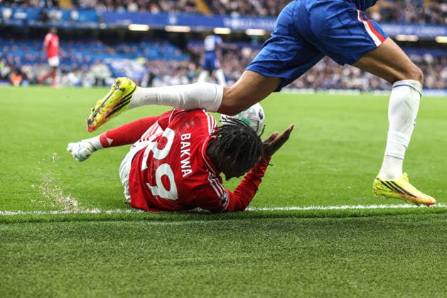 Chelsea v Nottingham Forest 4 May 2026, London - Premier League Football - Chelsea v Nottingham Forest - Dilane Bakwa of Nottingham Forest rolls beneath the feet of Joao Pedro of Chelsea - Photo: Charlotte Wilson Offside. London UK Copyright: xCharlottexWilsonx xOffsidexOffside