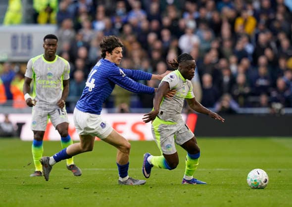 Liverpool, England, 4th May 2026. Merlin Röhl of Everton tackles Jeremy Doku of Manchester City during the Everton vs Manchester City Premier League match at Hill Dickinson Stadium, Liverpool. Picture credit should read: Andrew Yates Sportimage EDITORIAL USE ONLY. No use with unauthorised audio, video, data, fixture lists, club league logos or live services. Online in-match use limited to 120 images, no video emulation. No use in betting, games or single club league player publications. SPI_010_AY_Everton_Man_City SPI-4779-0010