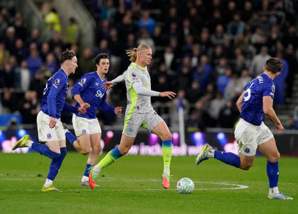 Liverpool, England, 4th May 2026. Erling Haaland of Manchester City occupies three Everton players during the Everton vs Manchester City Premier League match at Hill Dickinson Stadium, Liverpool. Picture credit should read: Andrew Yates Sportimage EDITORIAL USE ONLY. No use with unauthorised audio, video, data, fixture lists, club league logos or live services. Online in-match use limited to 120 images, no video emulation. No use in betting, games or single club league player publications. SPI_030_AY_Everton_Man_City SPI-4779-0031