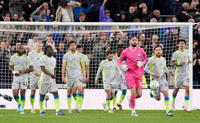 Liverpool, England, 4th May 2026. Dejected Manchester City players during the Everton vs Manchester City Premier League match at Hill Dickinson Stadium, Liverpool. Picture credit should read: Andrew Yates Sportimage EDITORIAL USE ONLY. No use with unauthorised audio, video, data, fixture lists, club league logos or live services. Online in-match use limited to 120 images, no video emulation. No use in betting, games or single club league player publications. SPI_041_AY_Everton_Man_City SPI-4779-0040