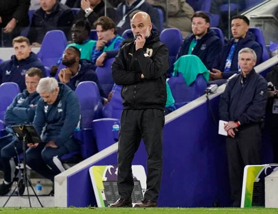 Liverpool, England, 4th May 2026. Dejected Pep Guardiola coach of Manchester City during the Everton vs Manchester City Premier League match at Hill Dickinson Stadium, Liverpool. Picture credit should read: Andrew Yates Sportimage EDITORIAL USE ONLY. No use with unauthorised audio, video, data, fixture lists, club league logos or live services. Online in-match use limited to 120 images, no video emulation. No use in betting, games or single club league player publications. SPI_042_AY_Everton_Man_City SPI-4779-0042