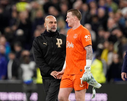 Liverpool, England, 4th May 2026. Pep Guardiola coach of Manchester City makes a point to Jordan Pickford of Everton during the Everton vs Manchester City Premier League match at Hill Dickinson Stadium, Liverpool. Picture credit should read: Andrew Yates Sportimage EDITORIAL USE ONLY. No use with unauthorised audio, video, data, fixture lists, club league logos or live services. Online in-match use limited to 120 images, no video emulation. No use in betting, games or single club league player publications. SPI_064_AY_Everton_Man_City SPI-4779-0064