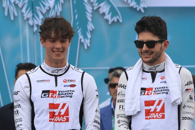 MIAMI GARDENS, FL - MAY 03: Haas F1 Team driver Esteban Ocon 31 and Haas F1 Team driver Oliver Bearman 87 stand during the national anthem prior to the running of the F1 Miami Grand Prix on May 03, 2026 at Miami International Autodrome in Miami Gardens, FL.(Photo by Jeff Robinson Icon Sportswire) AUTO: MAY 03 F1 Miami Grand Prix EDITORIAL USE ONLY Icon050326119611