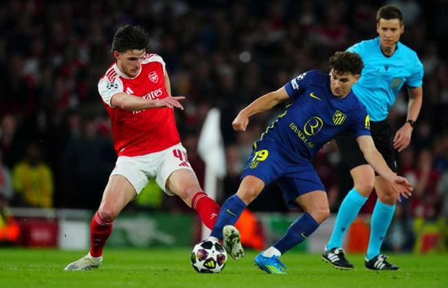 Declan Rice of Arsenal battles with Julian Ãlvarez of Atletico Madrid Arsenal v Atletico Madrid, UEFA Champions League, Semi Final, Second Leg, Football, Emirates Stadium, London, UK - 05 May 2026London Emirates Stadium United Kingdom EDITORIAL USE ONLY No use with unauthorised audio, video, data, fixture lists, club league logos or live services. Online in-match use limited to 120 images, no video emulation. No use in betting, games or single club league player publications.  Copyright: xJavierxGarcia Shutterstockx 16859995u