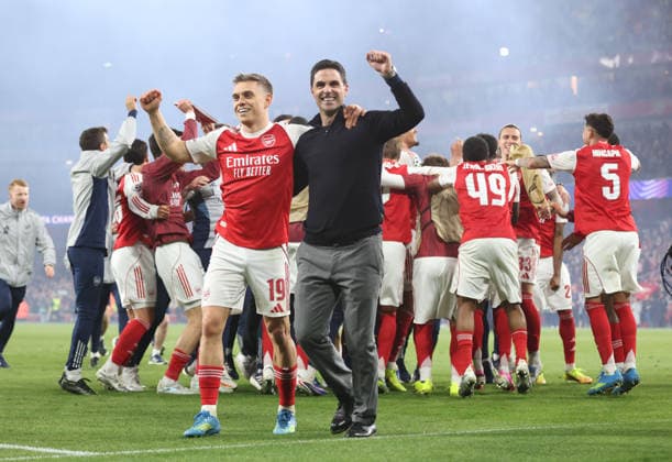 Leandro Trossard (A) and Mikel Arteta (Arsenal manager) dancing after the final whistle as Arsenal win at the Arsenal v Atletico Madrid UEFA Champions League semi-final 2nd leg match, at the Emirates Stadium, London, UK on 5th May, 2026.  .