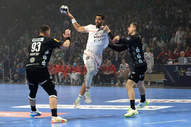 DEU, Machineseeker EHF Champions League, Fuechse Berlin vs. One VeszprŽm HC, 06.05.2026, Max-Schmeling-Halle, Berlin, DEU, Machineseeker EHF Champions League, Fuechse Berlin vs. One VeszprŽm HC, im Bild Mijajlo Marsenic (Fuechse Berlin 93), Nejc Cehte (Fuechse Berlin 22) , Ahmed Hesham (Veszprem 15)