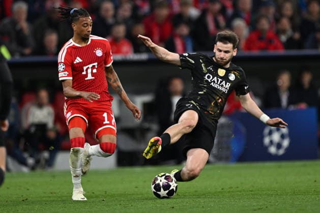 FC Bayern Munich v PSG - UEFA Champions League MUNICH, GERMANY - MAY6 : Khvicha Kvaratskhelia of Paris Saint-Germain in action against Michael Olise of FC Bayern Munich during the UEFA Champions League Semi-Final Second Leg match between FC Bayern Munich and Paris Saint-Germain at Football Arena Munich in Munich, Germany, on May 6, 2026. Halil Sagirkaya Anadolu Munich Germany. Editorial use only. Please get in touch for any other usage.  Copyright: x2026xAnadoluxHalilxSagirkayax