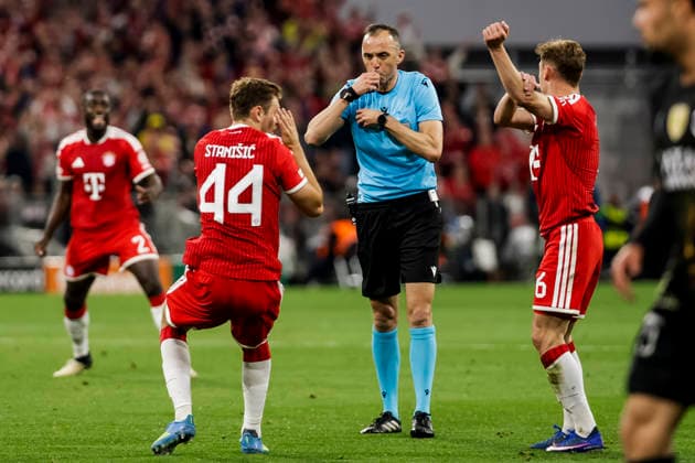 MUNICH, GERMANY - MAY 6: Josip Stanisic (FC Bayern Muenchen, 44) and Joshua Kimmich (FC Bayern Muenchen, 6) in discussion with referee Joao Pinheiro during the UEFA Champions League Semi-Final between FC Bayern Muenchen vs Paris Saint-Germain at Allianz Arena at Semi-Finals 2nd leg of the UEFA Champions League on May 6, 2026 in Munich, Germany. Bavaria Germany Copyright: xSteffiexWunderlx