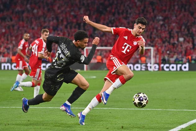 Aleksandar PAVLOVIC (Bayern Muenchen), Aktion,Zweikampf gegen Warren Zaire-Emery (PSG). Fussball Champions League,Saison 2025 26, Halbfinale FC Bayern-Muenchen - Paris Saint Germain (PSG) am 06.05.2026 A L L I A N Z A R E N A.