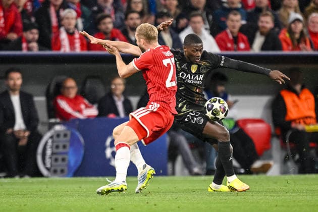 Konrad Laimer (FC Bayern München) and Nuno Mendes (Paris Saint-Germain FC) battle for the ball during the UEFA Champions League 2025 26 Semi Final Second Leg match between FC Bayern München and Paris Saint-Germain at Football Arena Munich on May 6, 2026 in Munich, Germany. (Photo by Harry Langer DeFodi Images) -