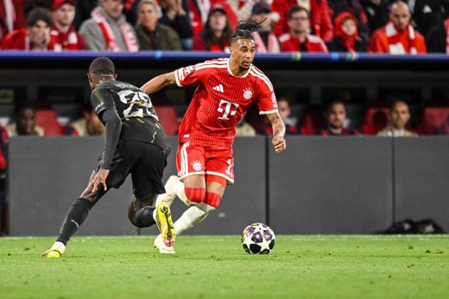 Nuno Mendes (Paris Saint-Germain FC) and Michael Olise (FC Bayern München) battle for the ball during the UEFA Champions League 2025 26 Semi Final Second Leg match between FC Bayern München and Paris Saint-Germain at Football Arena Munich on May 6, 2026 in Munich, Germany. (Photo by Harry Langer DeFodi Images) -