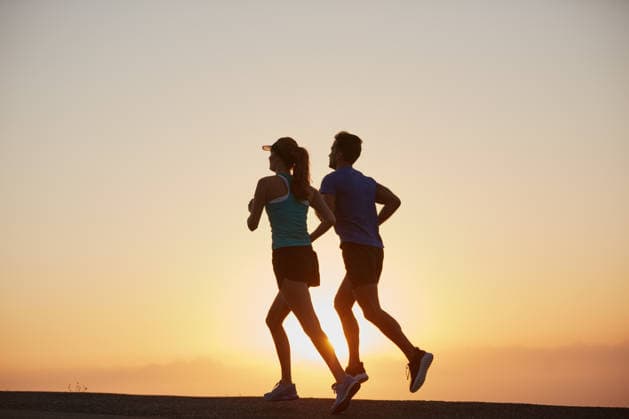 Stop wishing and start doing. a silhouetted couple out for a run at sunrise (License=RF) 20059767 ,model released, Symbolfoto  Copyright: xZoonar.com KasperxRavlox 20059767 ,model released, Symbolfoto ,property released