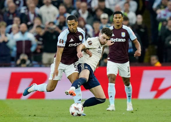 Birmingham, England, 7th May 2026. Youri Tielemans of Aston Villa (l) and Neco Williams of Nottingham Forest (r) during the Aston Villa vs Nottingham Forest UEFA Europa League semi final match 2nd leg match at Villa Park, Birmingham. Picture credit should read: Andrew Yates Sportimage EDITORIAL USE ONLY. No use with unauthorised audio, video, data, fixture lists, club league logos or live services. Online in-match use limited to 120 images, no video emulation. No use in betting, games or single club league player publications. SPI_052_AY_Villa_Forest SPI-4782-0052