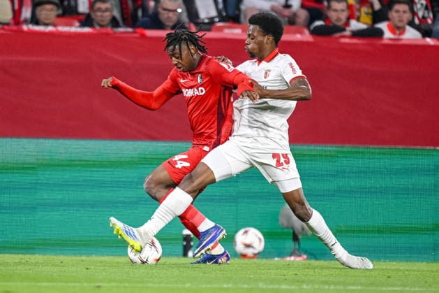 Johan Manzambi (SC Freiburg) and Jean-Baptiste Gorby (SC Braga) battle for the ball during the UEFA Europa League 2025 26 Semi-Final Second Leg match between Club Freiburg and SC Braga at Stadion am Wolfswinkel on May 7, 2026 in Freiburg im Breisgau, Germany. (Photo by Harry Langer DeFodi Images) -