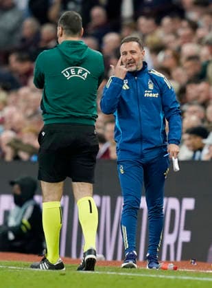 Birmingham, England, 7th May 2026. Victor Pereira manager of Nottingham Forest (r) raises an objection with the fourth official during the Aston Villa vs Nottingham Forest UEFA Europa League semi final match 2nd leg match at Villa Park, Birmingham. Picture credit should read: Andrew Yates Sportimage EDITORIAL USE ONLY. No use with unauthorised audio, video, data, fixture lists, club league logos or live services. Online in-match use limited to 120 images, no video emulation. No use in betting, games or single club league player publications. SPI_060_AY_Villa_Forest SPI-4782-0060