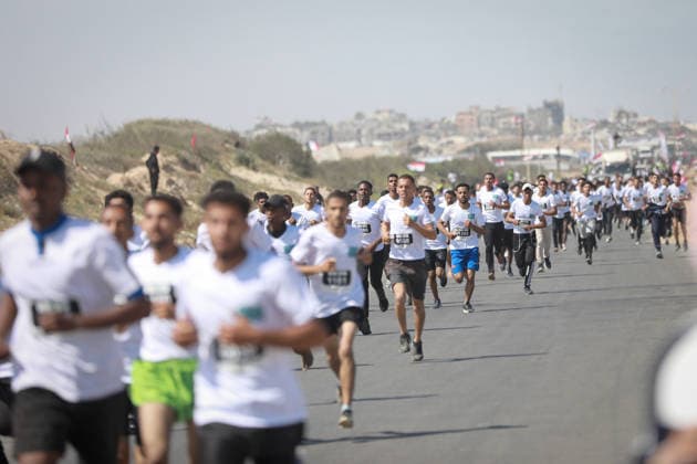 Sport Bilder des Tages Run for Freedom Marathon in Gaza GAZA CITY, GAZA, PALESTINE - MAY 08: Palestinians, including those who lost limbs during Israeli attacks, participate in a marathon organized under the slogan Run for Freedom in Gaza City, Gaza, Palestine on May 08, 2026. Despite more than two years of devastating Israeli attacks and a continuous blockade on the Gaza Strip, efforts to revive sporting and social activities persist as a symbol of resilience. The event was organized by the Palestinian Council for Youth and Sports in coordination with the Egyptian Committee. The race commenced in the al-Zahra region and concluded in the Sheikh Ajlin neighborhood, bringing together participants of various age groups. The marathon provided a rare opportunity for Gazans to find respite from the psychological and physical impacts of the conflict while demonstrating their determination to maintain communal life amidst the widespread destruction. Abdalhkem Abu Riash Anadolu Gaza City Gaza. Editorial use only. Please get in touch for any other usage.  Copyright: x2026xAnadoluxAbdalhkemxAbuxRiashx