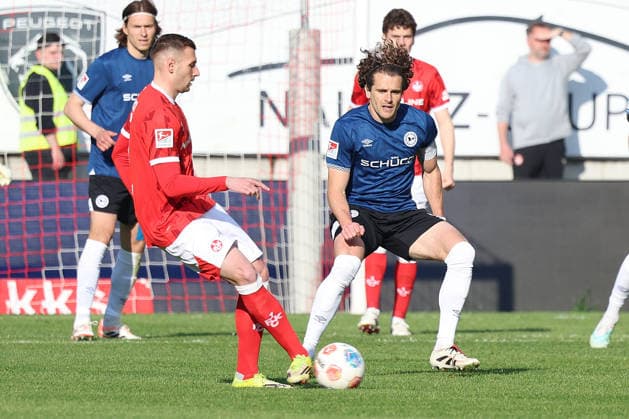 08.05.2026, xrekx, Fussball 2.Bundesliga, 1.FC Kaiserslautern - Arminia Bielefeld v.l. Luca Sirch (1.FC Kaiserslautern) Mael Corboz (Arminia Bielefeld) (DFL DFB REGULATIONS PROHIBIT ANY USE OF PHOTOGRAPHS as IMAGE SEQUENCES and or QUASI-VIDEO) Kaiserslautern